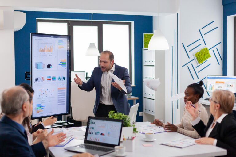 Angry mad boss shouting having conflict with multiethnic employee
